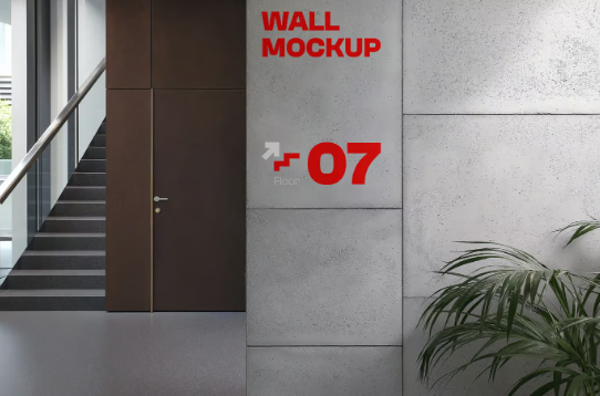 Mockup of a Concrete Wall with a Plant on an Office Background