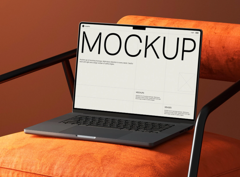 Free MacBook Pro Mockup on Velvet Chair Elegant and Realistic Laptop PSD Scene for Website and App Design