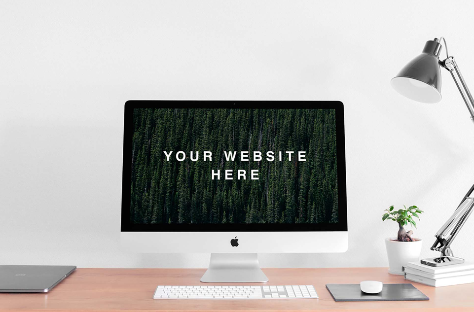 Free iMac on Desk Mockup (Realistic Workspace PSD Template)