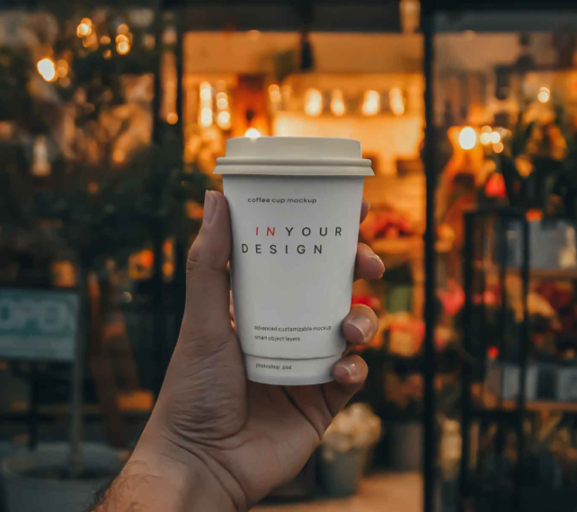 Coffee Cup in Hand Mockup