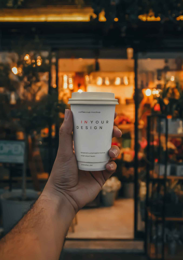 Coffee Cup in Hand Mockup