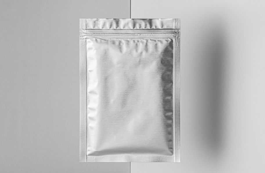 The Flat PSD Pouch Packaging Mockup is a versatile and professional design tool created to showcase your packaging concepts with a high level of realism and visual appeal. This mockup features a gravity-style pouch with a flat metallic finish, offering a clean and modern presentation that emphasizes the surface and details of your design. It is particularly suitable for a wide range of products, including food items, cosmetics, supplements, and specialty goods.