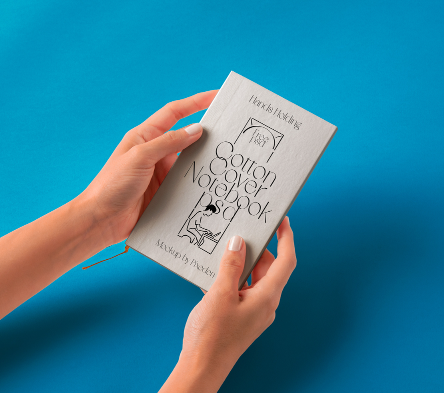 Hand Holding Cotton Notebook Mockup