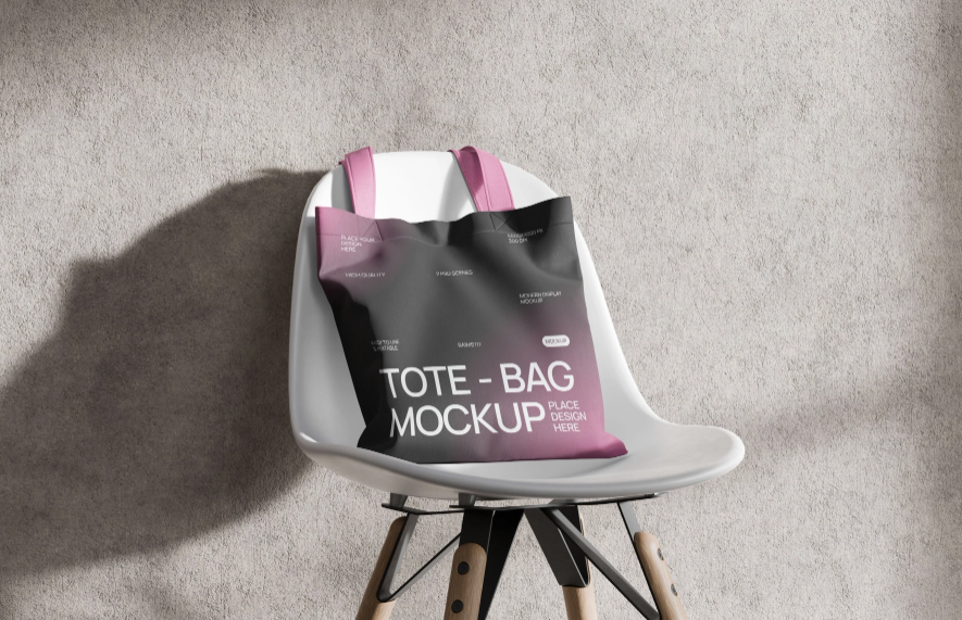 Tote Bag Mockup on Chair with Concrete Background