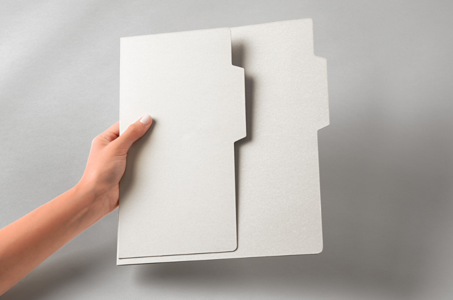 Hand Holding Stationery PSD Folder Set Mockup