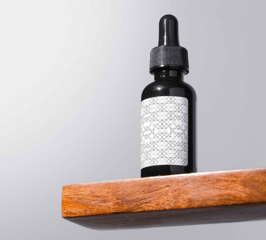 Dropper on Shelf Mockup Bottle PSD