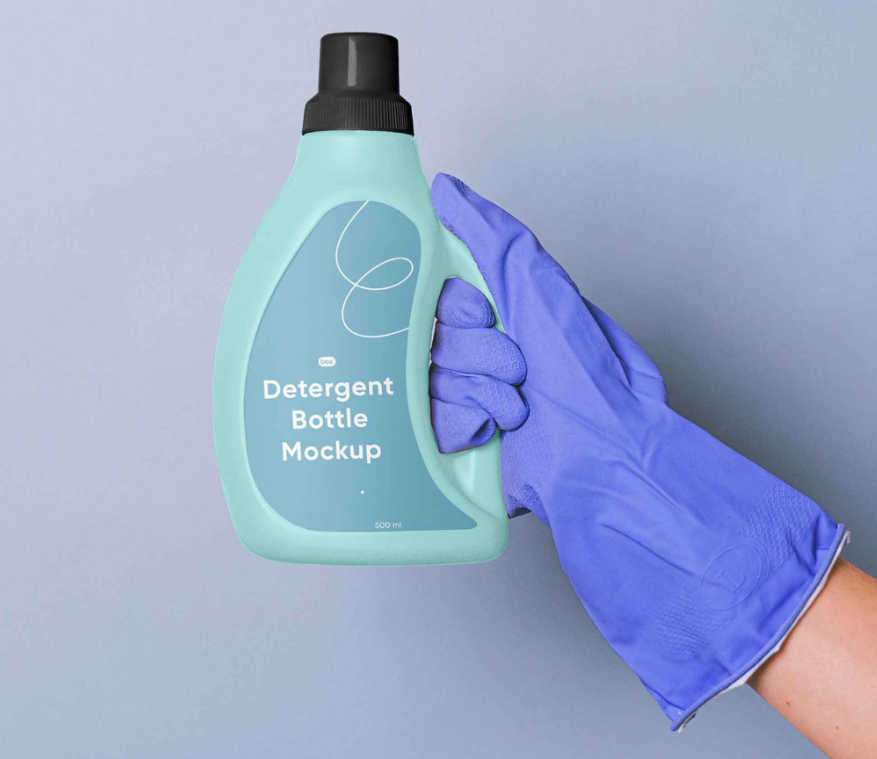 Free Detergent Bottle Mockup Hand Held cleaning Product Scene