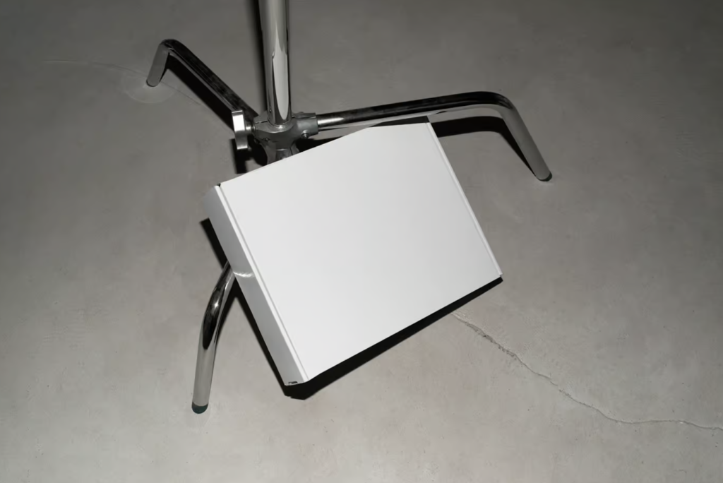 White cardboard Box on Tripod Mockup