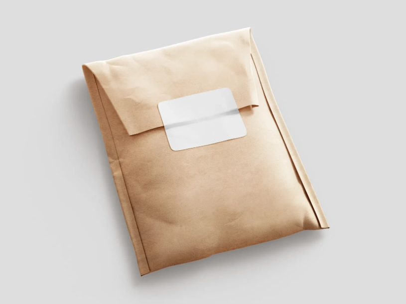 Kraft Paper Postal Bag and Sticker Mockup PSD