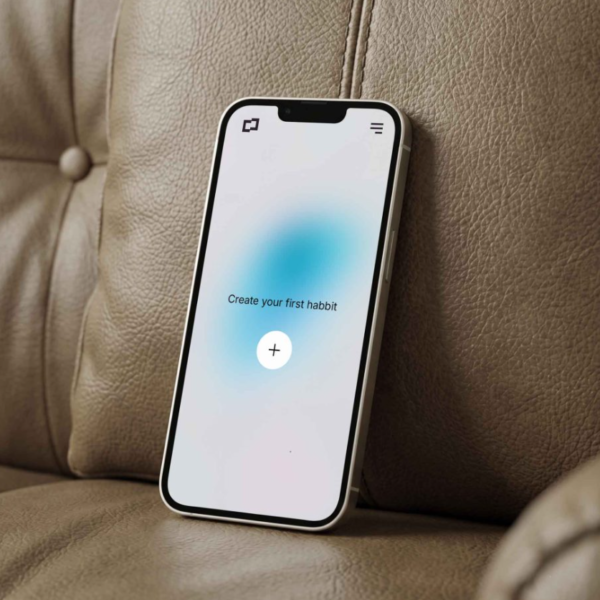 Phone Mockup on Leather Sofa