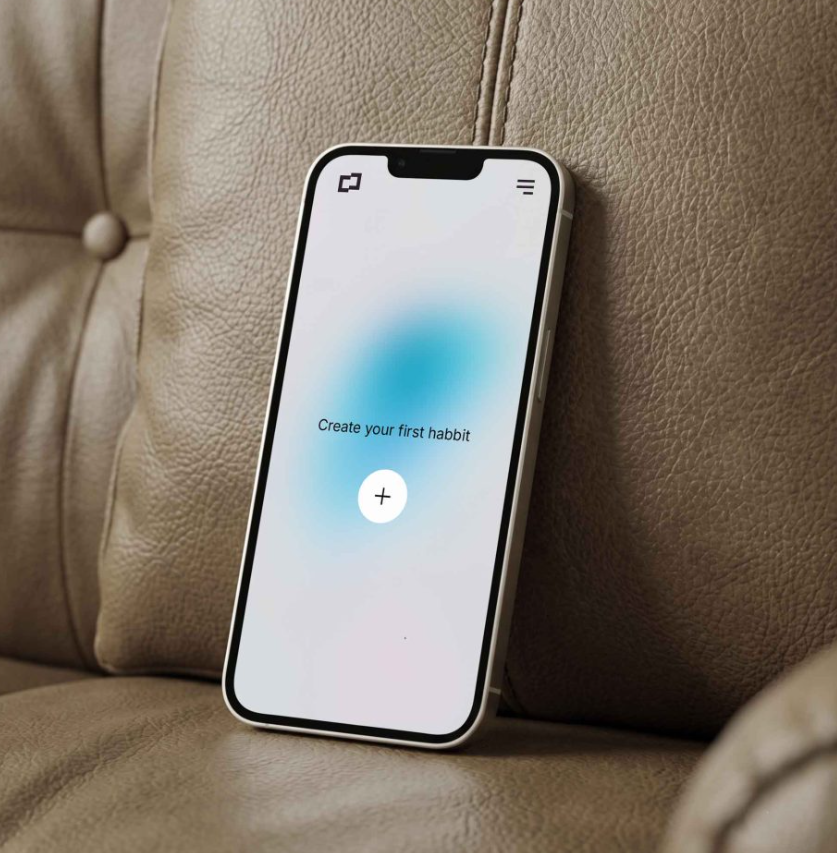Phone Mockup on Leather Sofa